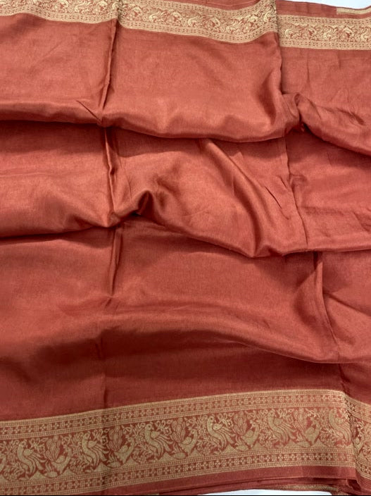 Rust Meenakari Pallu Dola Silk Saree