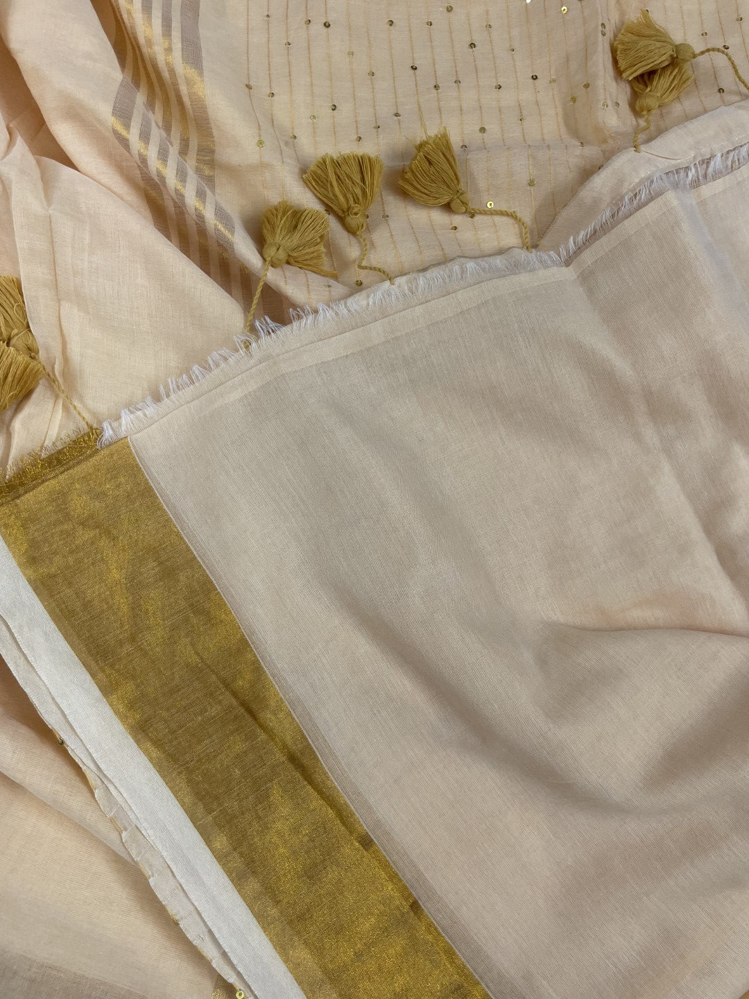 Off White Sequence Pallu Mul Cotton Saree