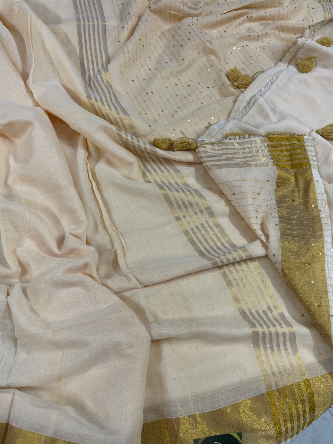 Off White Sequence Pallu Mul Cotton Saree