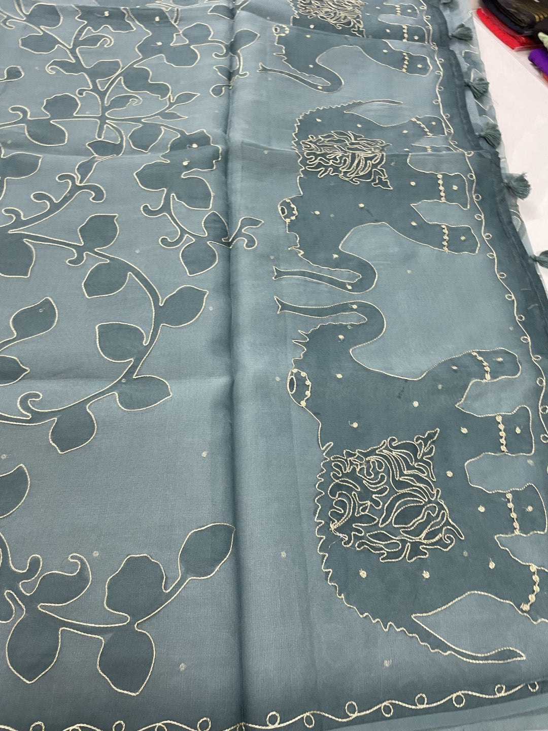 Dusty Blue Printed Zari Highlight Organza Saree